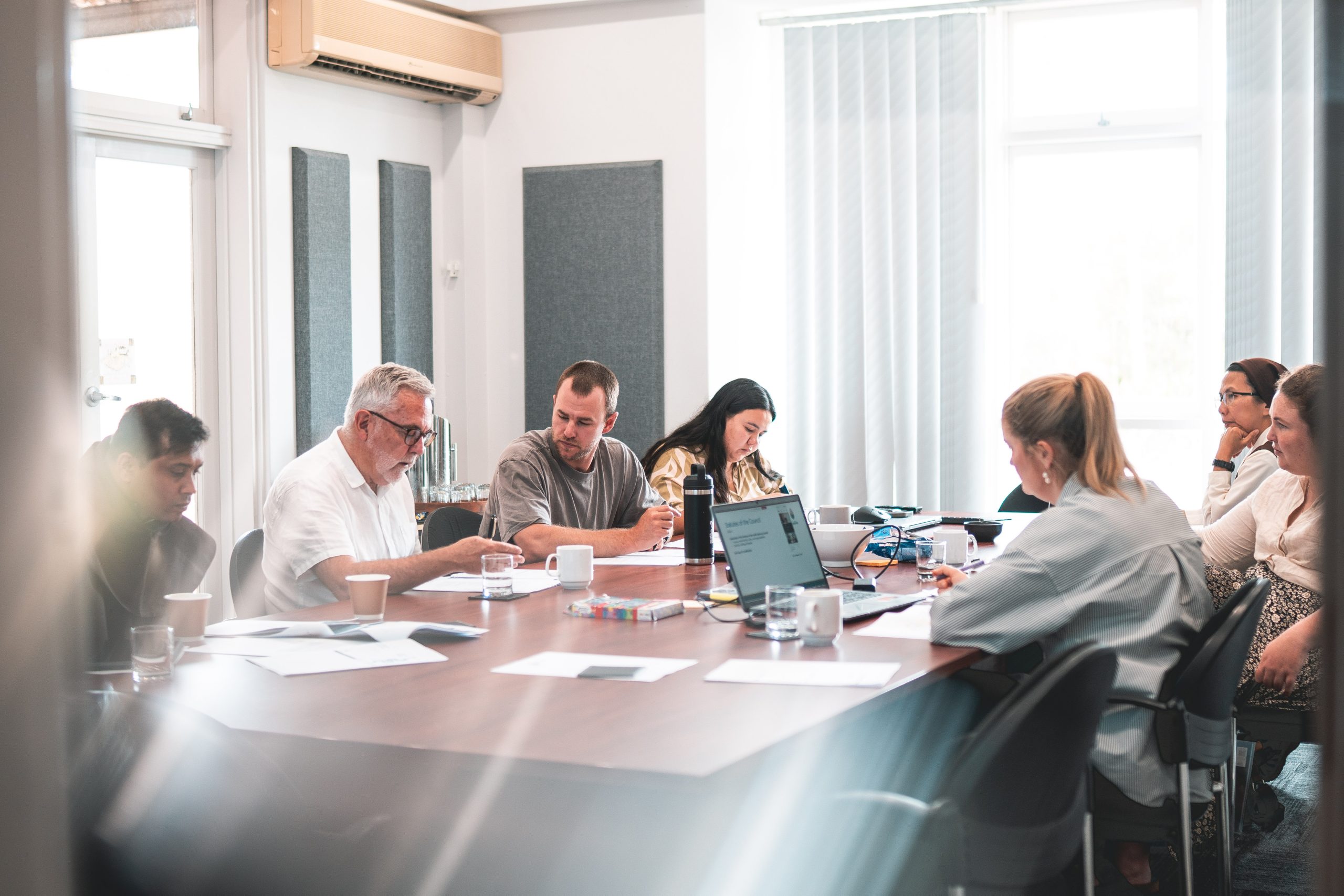 Meeting around a conference table.